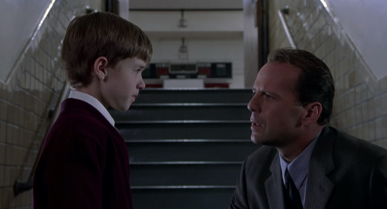 Haley Joel Osment and Bruce Willis in The Sixth Sense (1999). 