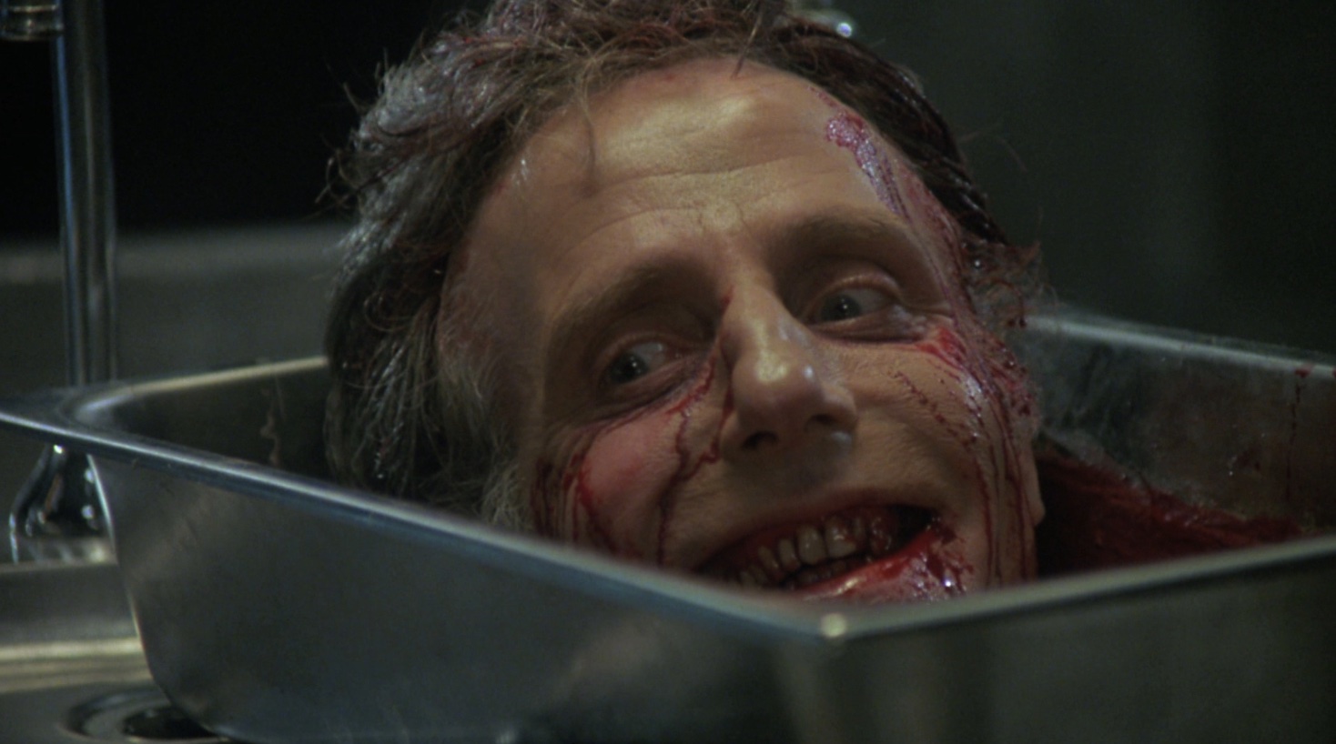 David Gale in Re-Animator (1985).