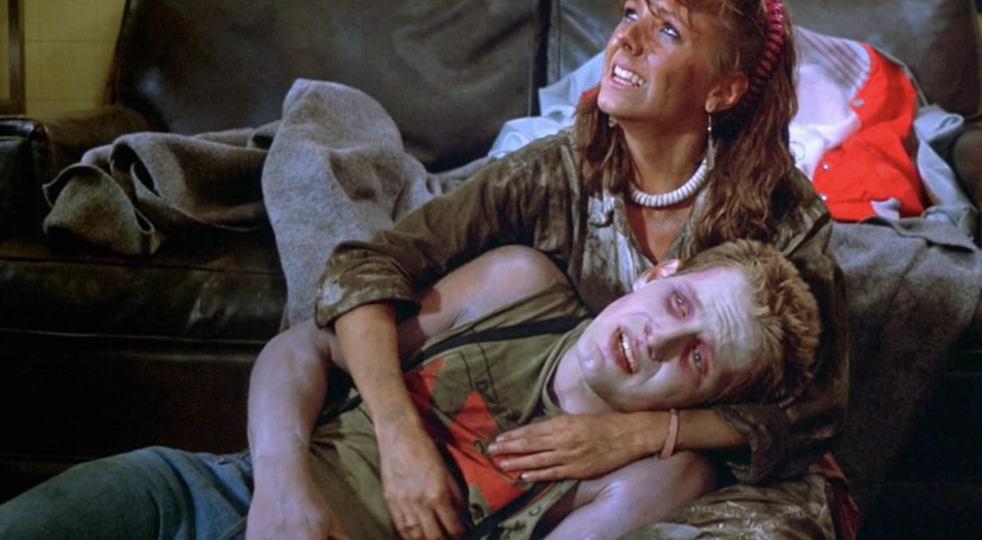 Thom Mathews and Beverly Randolph in The Return of the Living Dead (1985).