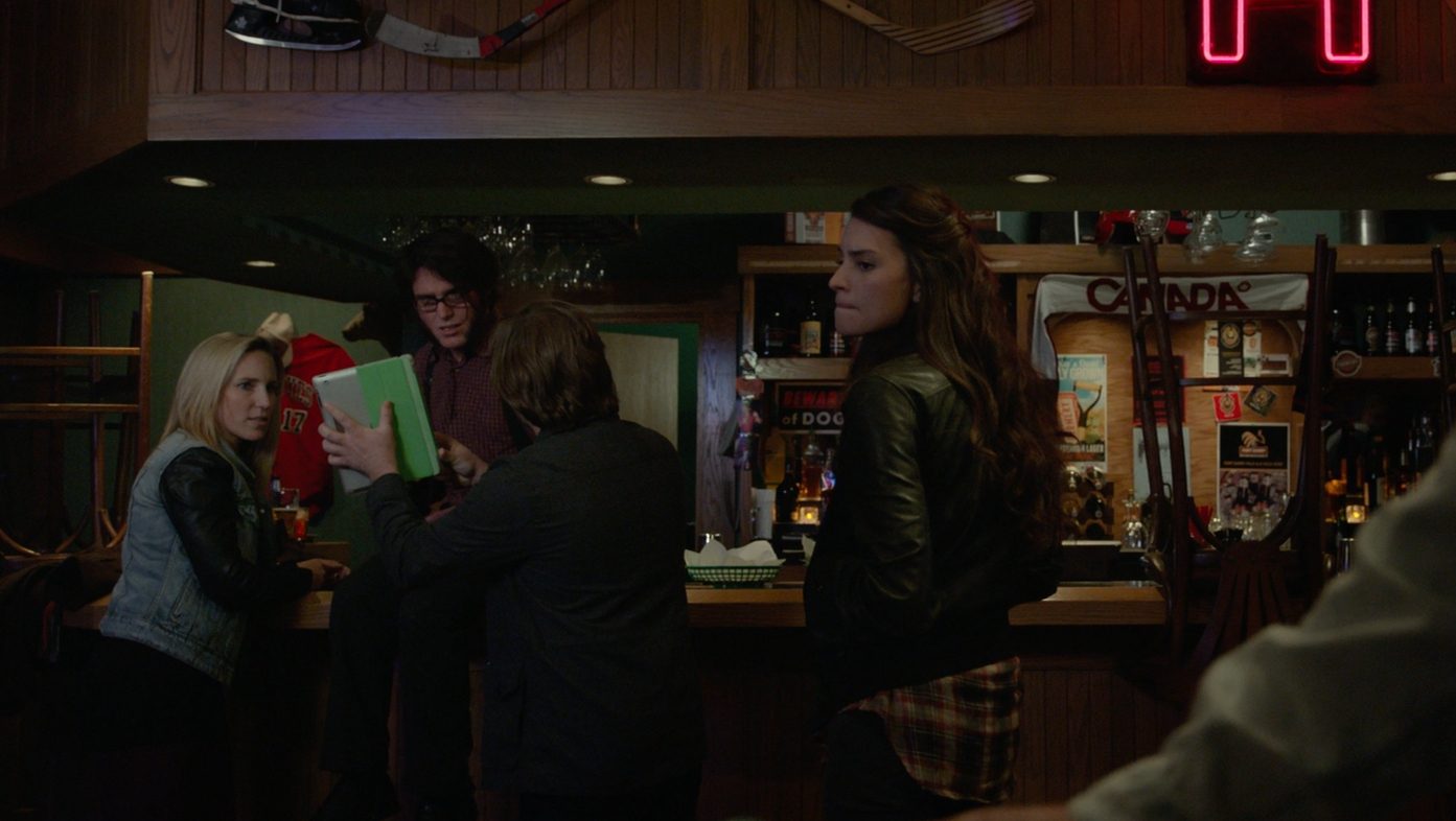 Genesis Rodriguez and Chris Parkinson in Tusk (2014).