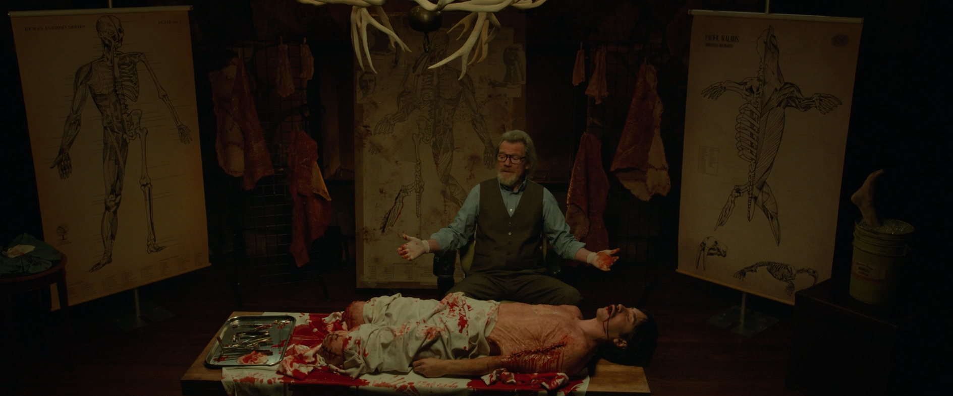 Michael Parks and Justin Long in Tusk (2014).