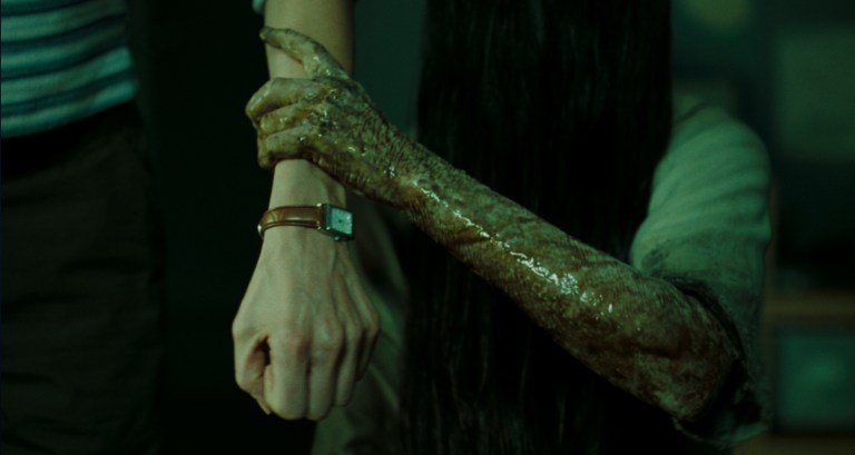 Samara grabbing Rachel in The Ring (2002).