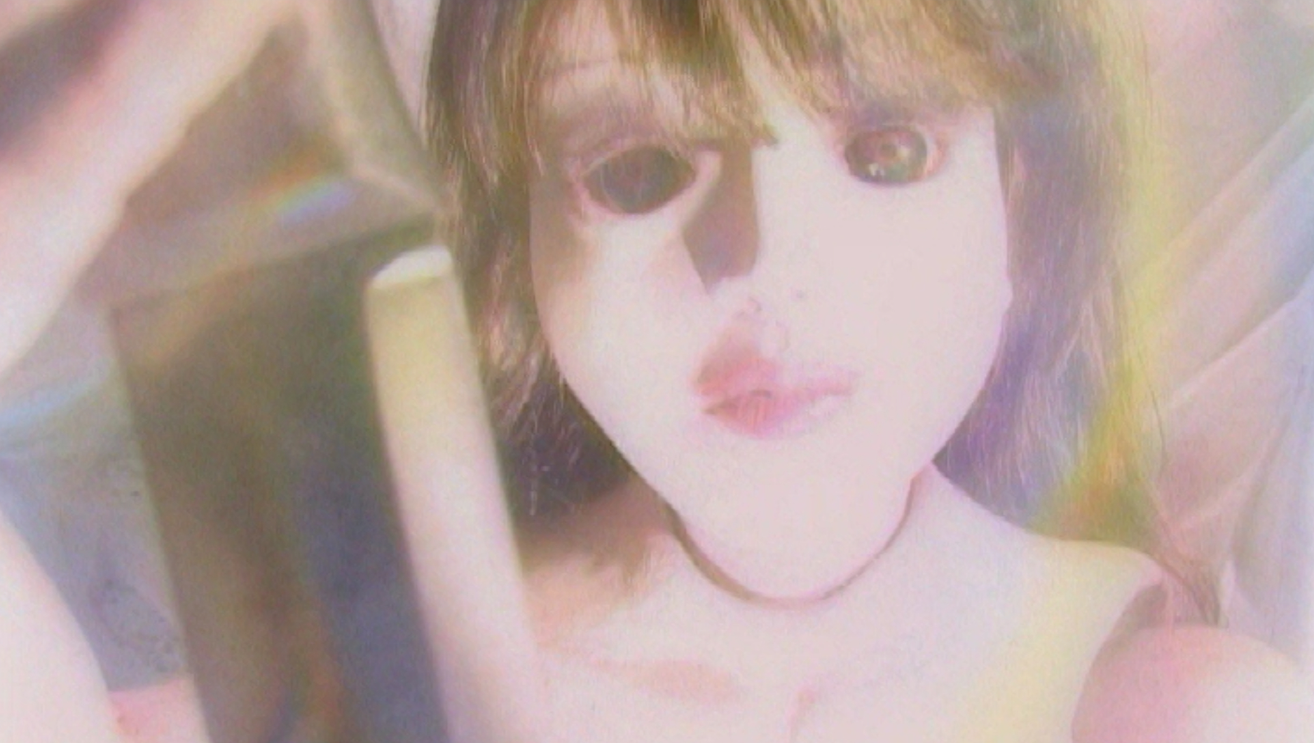 A doll stares blankly in Marronnier (2003).