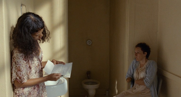 Maren reads a letter from her mother in Bones and All (2022).