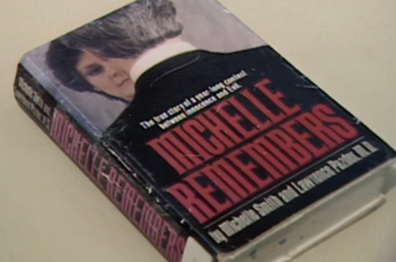 An image of the book Michelle Remembers from the documentary Satan Wants You (2023).