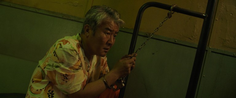 Son Jong-hak as Son Soo-cheol in Project Wolf Hunting (2022).