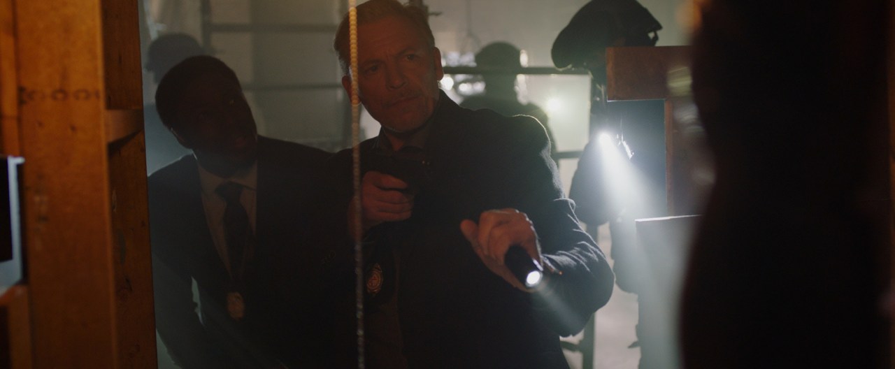 Hunt and Halloran discover a dead body in Eleanor Bonneville's apartment in Jigsaw (2017).