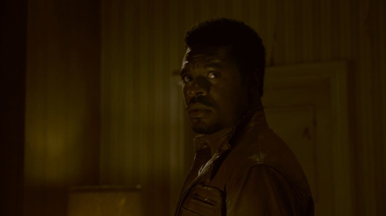 Lyriq Bent as Daniel Rigg in Saw IV (2007).