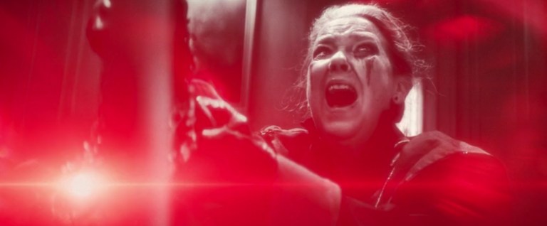 Verussa holds the Bloodstone in Werewolf by Night (2022).