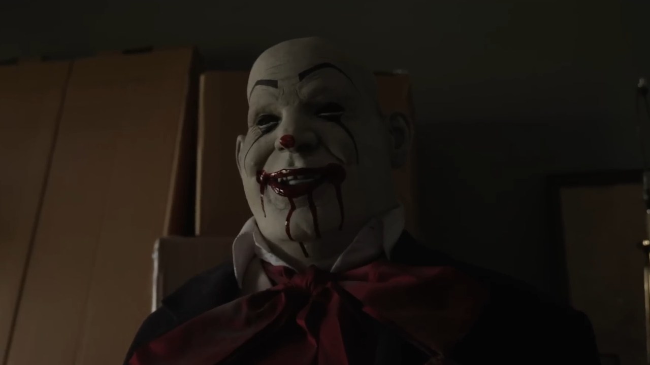 A creepy clown mannequin in Hall House LLC Origins (2023).