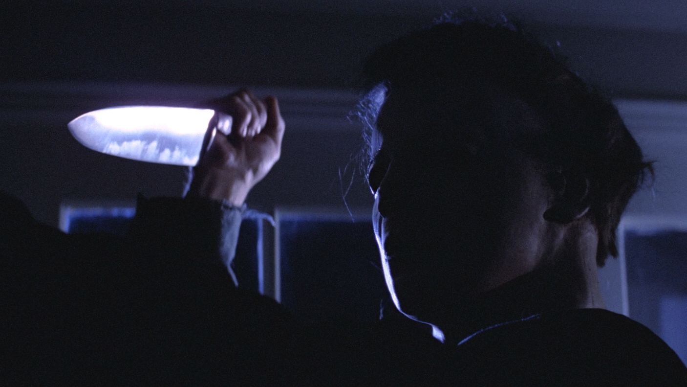 Michael Myers brandishes a kitchen knife in Halloween (1978).