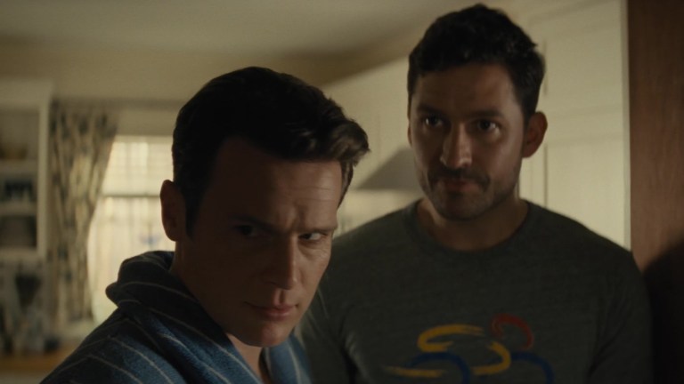 Jonathan Groff and Ben Aldridge as Eric and Andrew in Knock at the Cabin (2023).