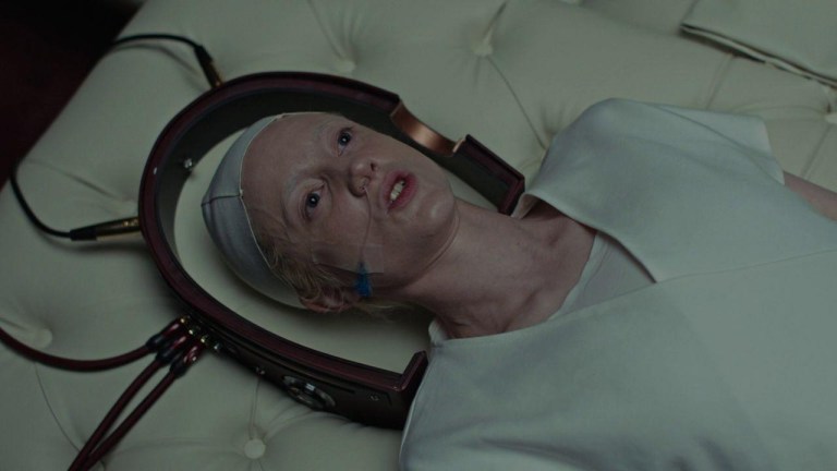 Andrea Riseborough prepares for a mind-swap in Possessor (2020).