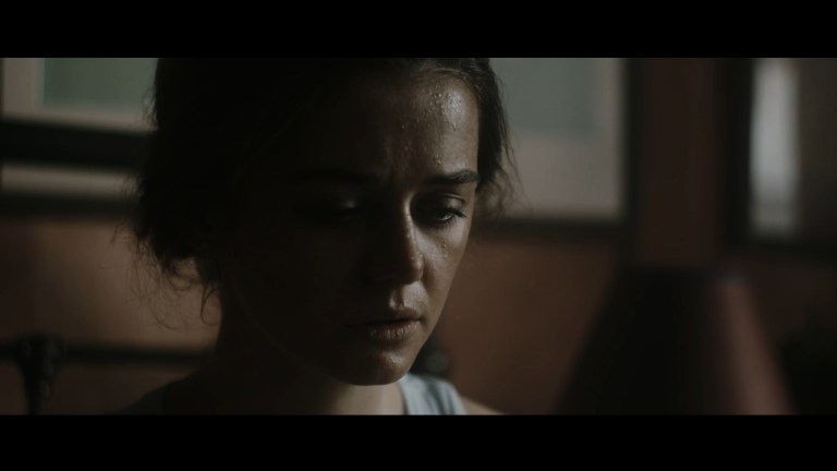 Alice is sick and sweating in Alice in Terrorland.