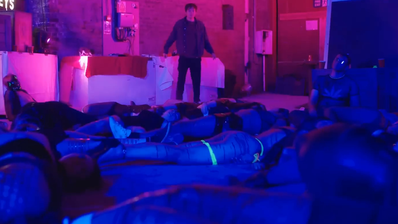 Christopher Robin looks at a floor full of bodies in Winnie-the-Pooh: Blood and Honey 2.