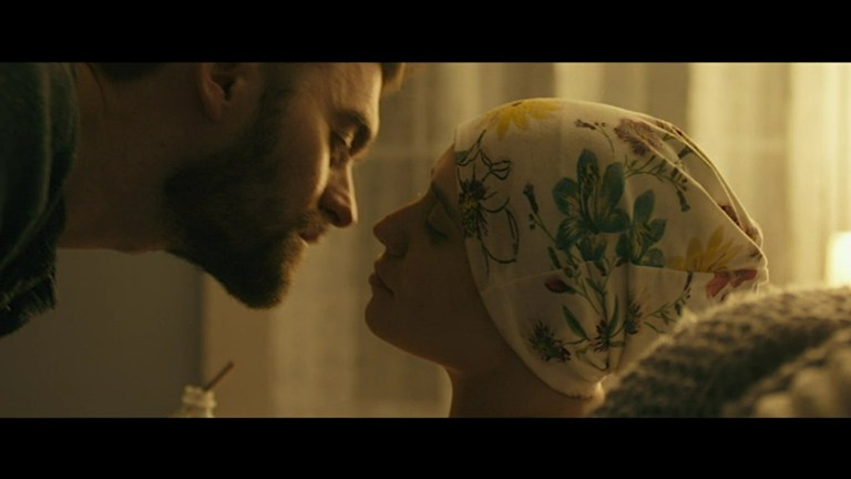Matt and Claire hesitate before a kiss in Bag of Lies (2024).