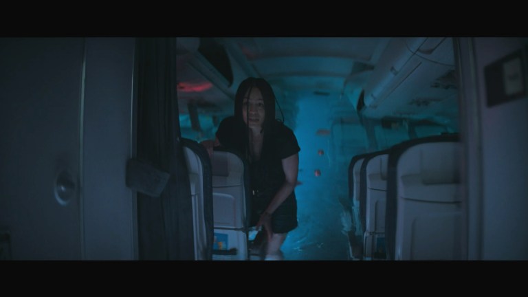 Sophie McIntosh stars as Ava in No Way Up (2024).