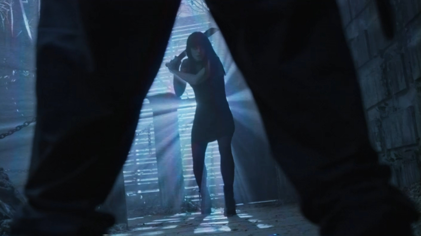 Bowie holds a machete in the movie within a movie Flesh Eating Freaks, as seen in Faceless After Dark (2023).