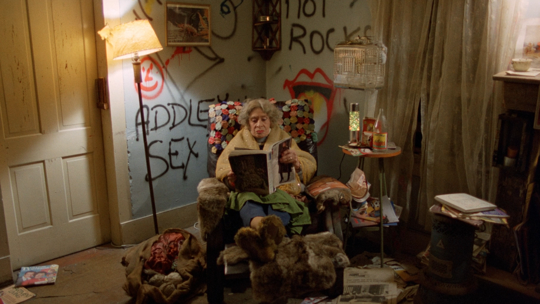 Mother sits in a chair in Mother's Day (1980).