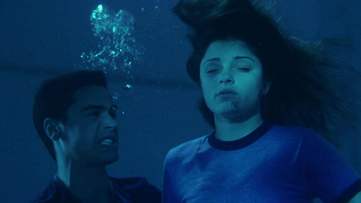 Ben tries to save Amy in Swimfan (2002).