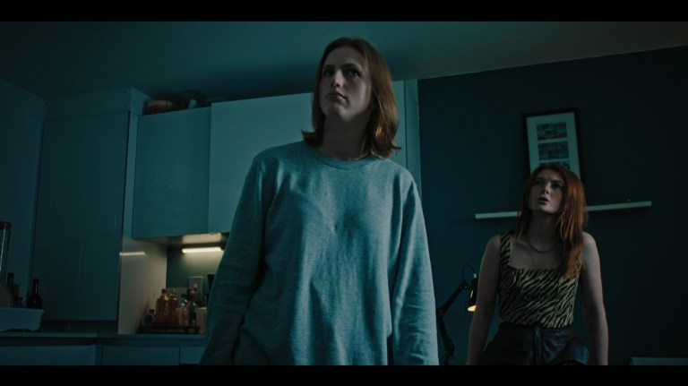 Dakota and Rose listen for Axel in Kill Your Lover (2023).
