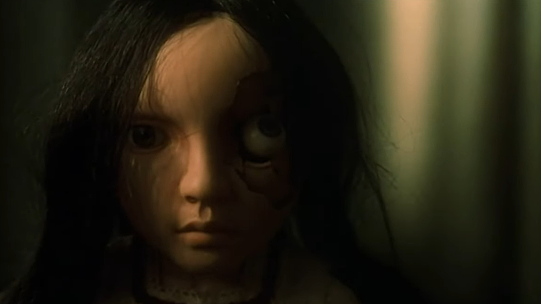 A doll with a broken eye socket in Reincarnation (2005).