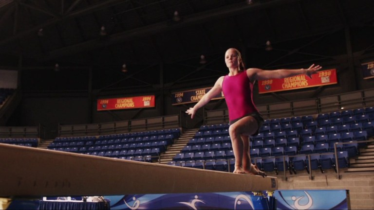 Candice performs on a balance beam in Final Destination 5 (2011).