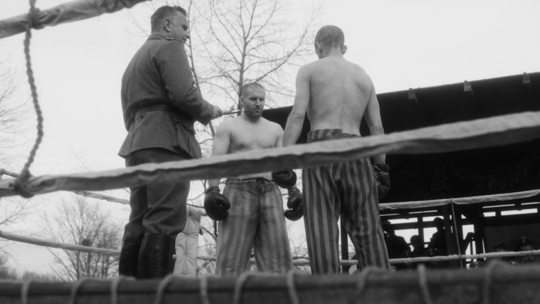 A boxing match at a concentration camp in The Survivor (2021).