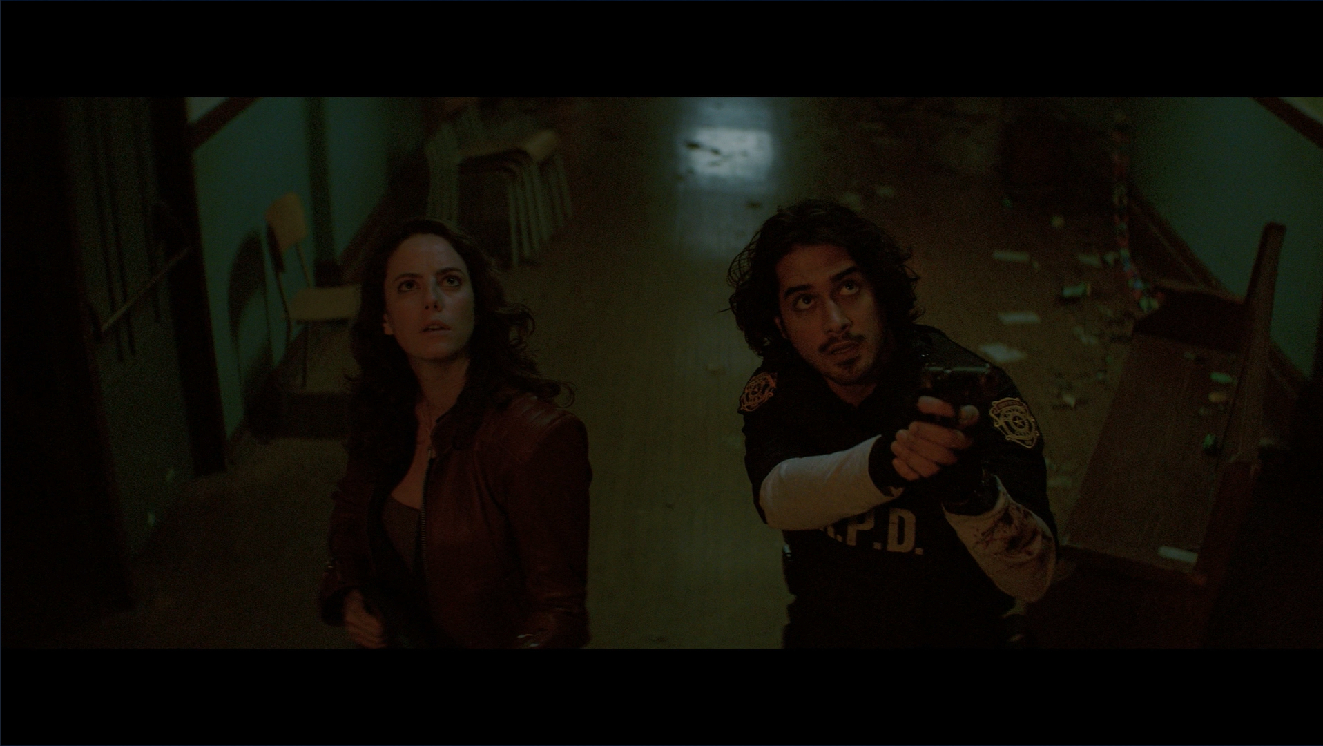Kaya Scodelario and Avan Jogia as Claire Redfield and Leon S. Kennedy in Resident Evil: Welcome to Raccoon City