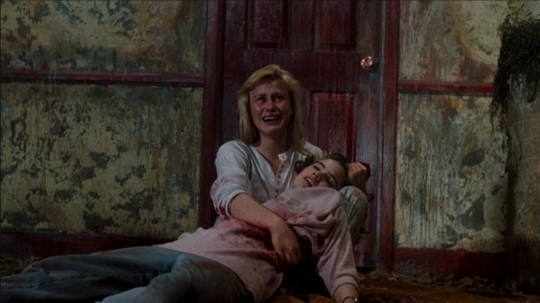 Kristen holds Nancy's body in A Nightmare on Elm Street 3: Dream Warriors (1987).
