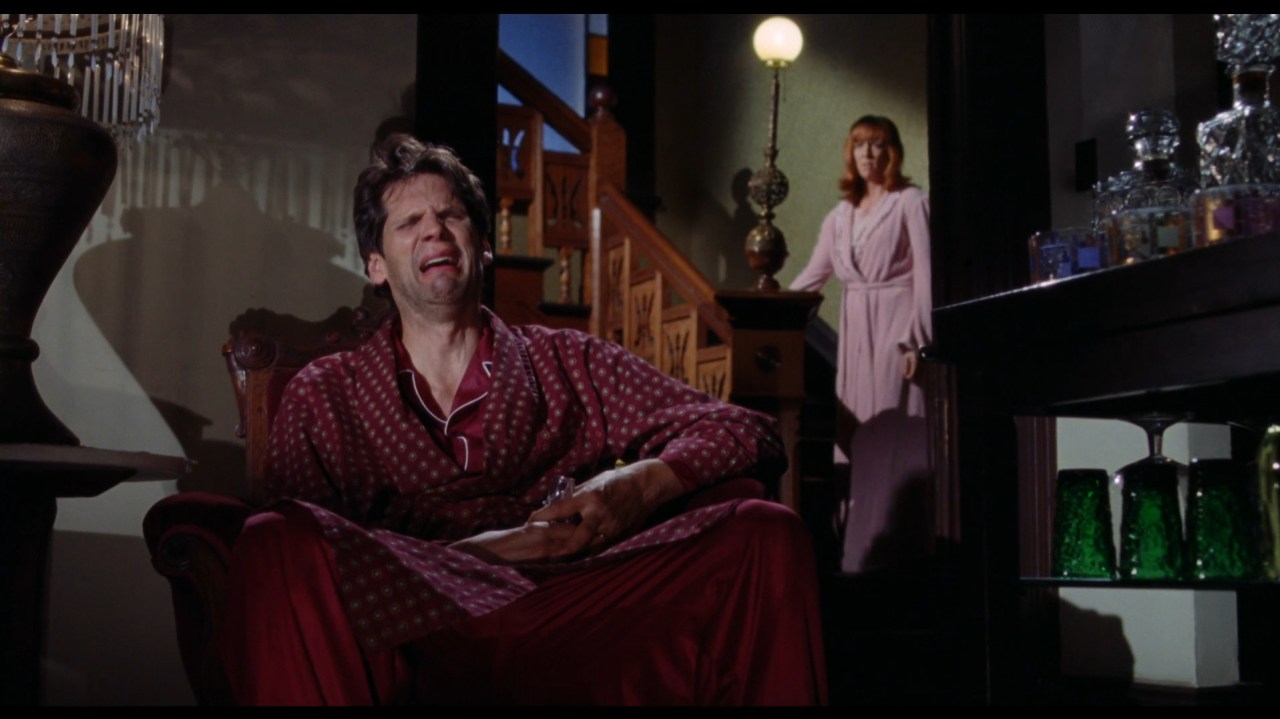 Richard wails as Trish watches in The Love Witch (2016).