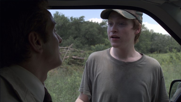 Caleb warns Cotton Marcus to turn around and go home in The Last Exorcism (2010).