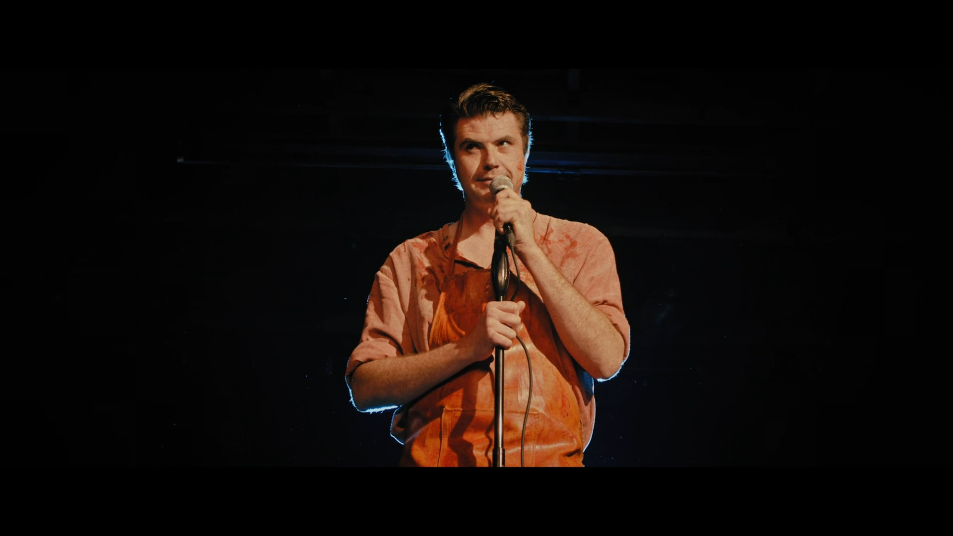 Aaron Prager plays Charlie, the Cannibal Comedian.