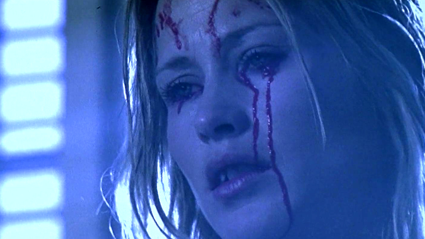 Patricia Arquette stars in Stigmata (1999).